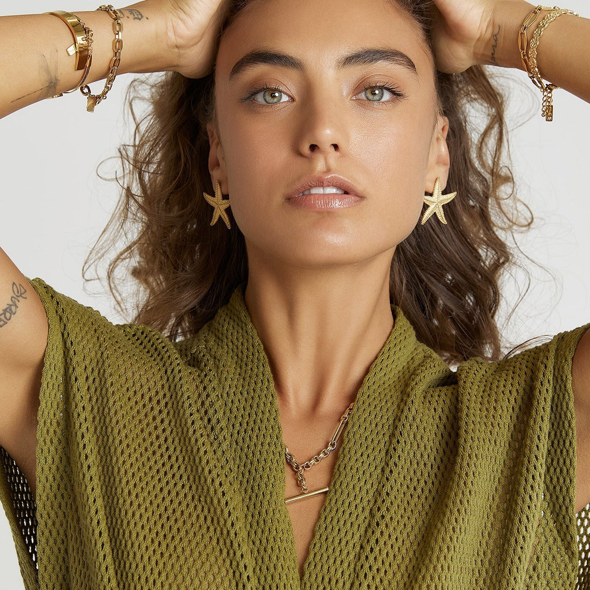 Aretes de Estrella de Mar Dorada