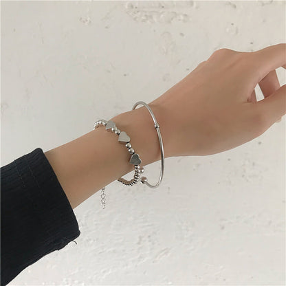 Dúo de Pulseras Retro Heart