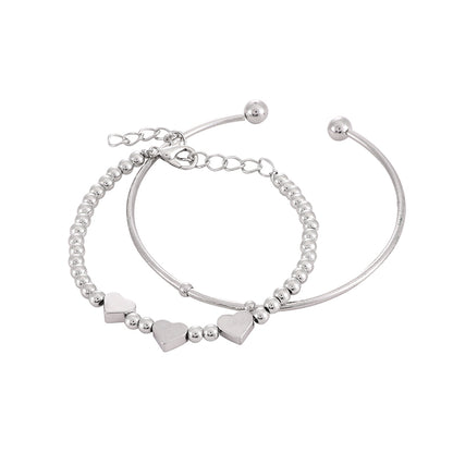 Dúo de Pulseras Retro Heart