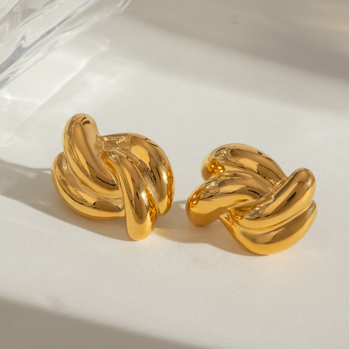 Aretes para Mujer de Acero Inoxidable con Diseño de Nudo Cruzado