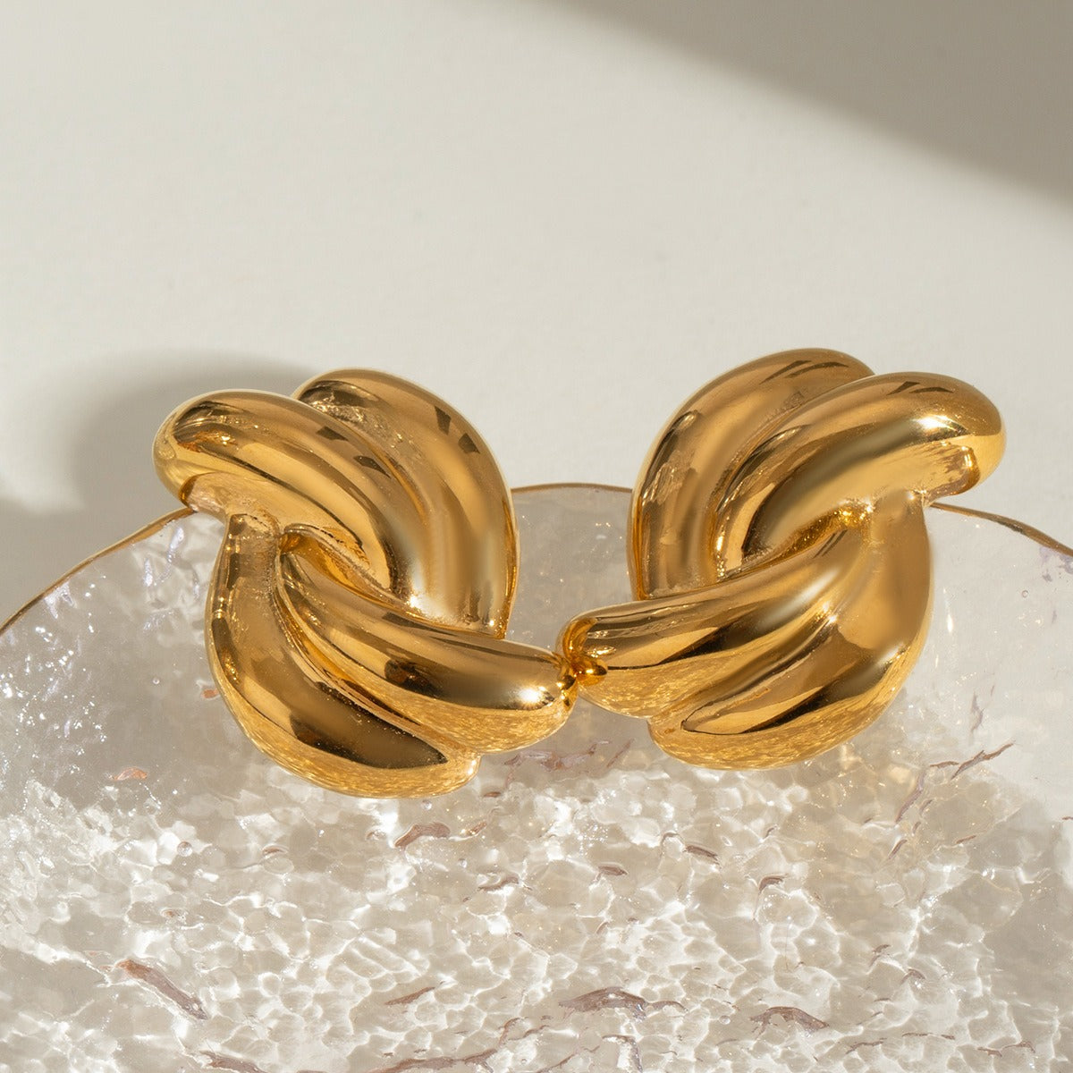 Aretes para Mujer de Acero Inoxidable con Diseño de Nudo Cruzado